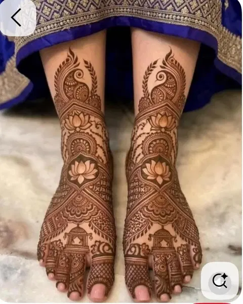 bridal indian figure back hand mehndi design