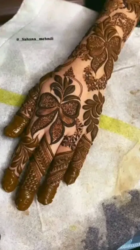 aesthetic arabic flower back hand mehndi design