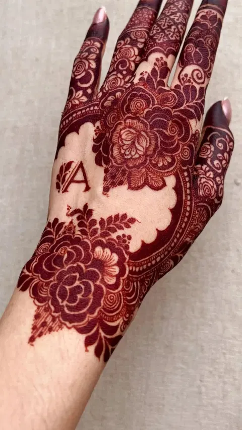 arabic figure back hand mehndi design