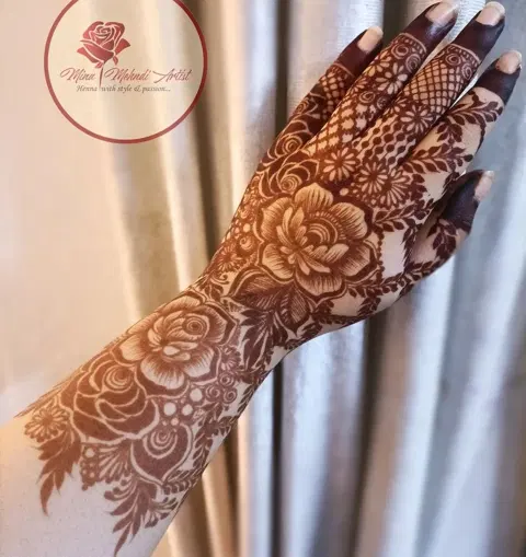 aesthetic arabic flower back hand mehndi design