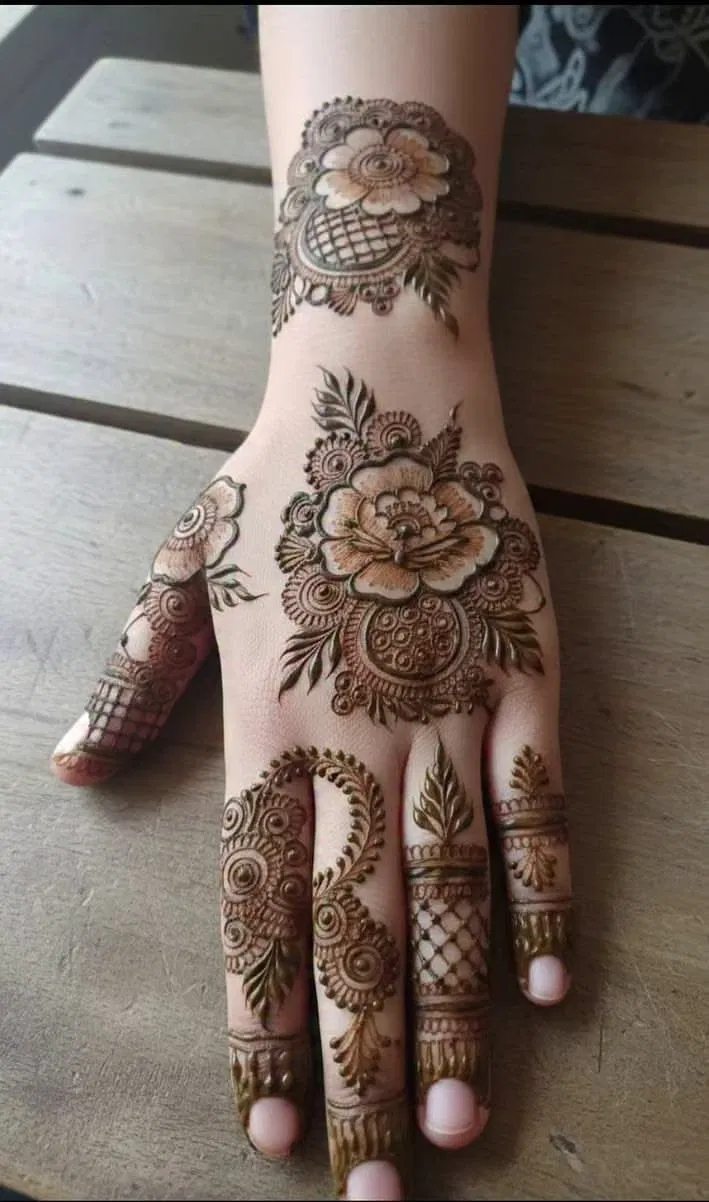 Simple Stylish Arm Mehndi Design with Gol Tikki and Flowers