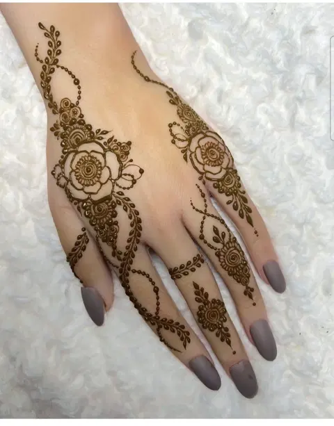 aesthetic arabic flower back hand mehndi design