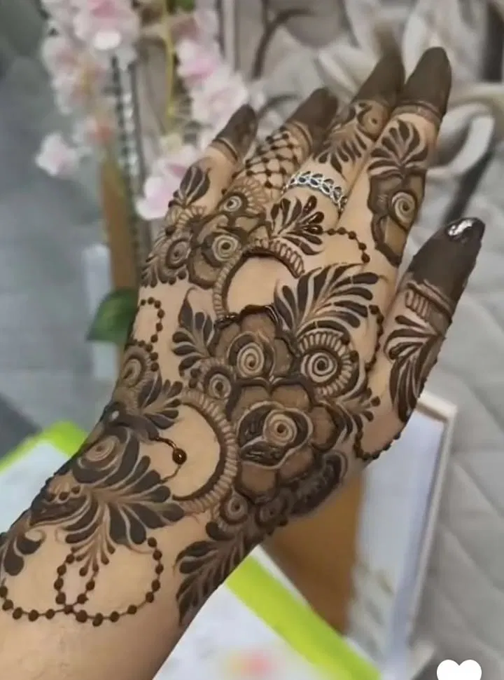 Aesthetic Pakistani Back Hand Mehndi Design with Gol Tikki and Flowers for Engagement