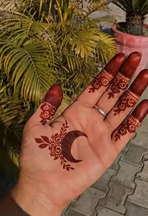 aesthetic arabic moon finger mehndi design