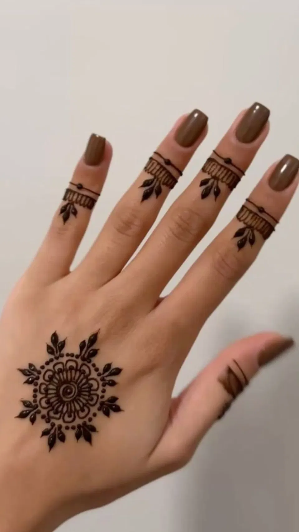 Arabic Minimal Back Hand Mehndi Design with Lotus
