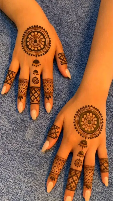 aesthetic indian bel back hand mehndi design