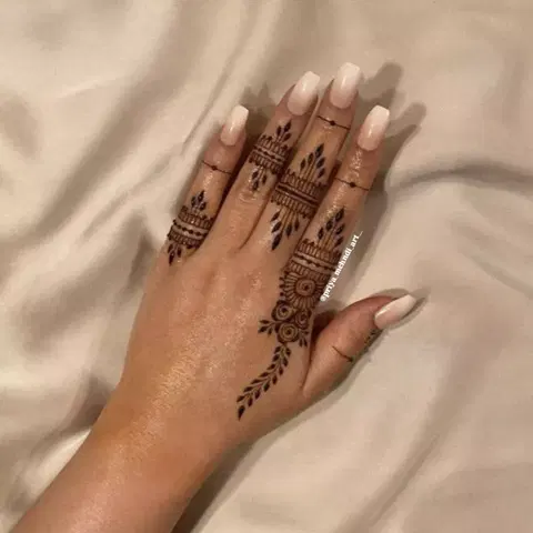 minimal royal jaal back hand mehndi design