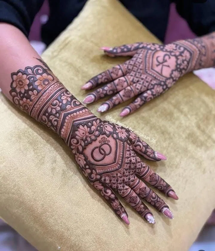 Bridal Simple Back Hand Mehndi Design with Figures and Hearts for Engagement