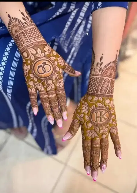 bridal simple figure back hand mehndi design