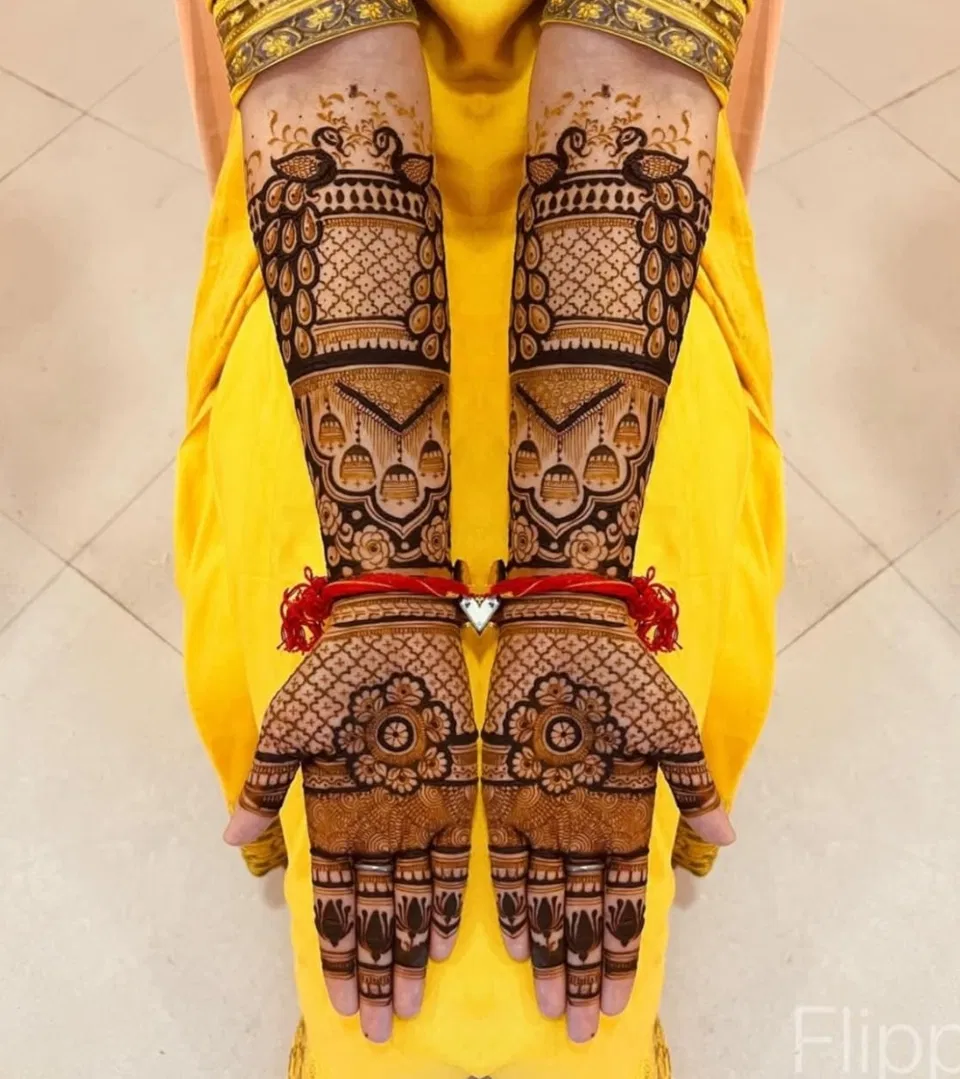 Bridal Back Hand Mehndi Design with Figures