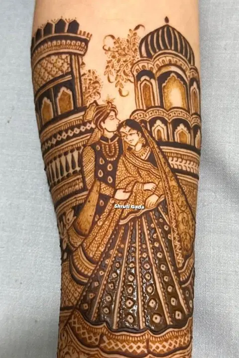 bridal deity arm mehndi design