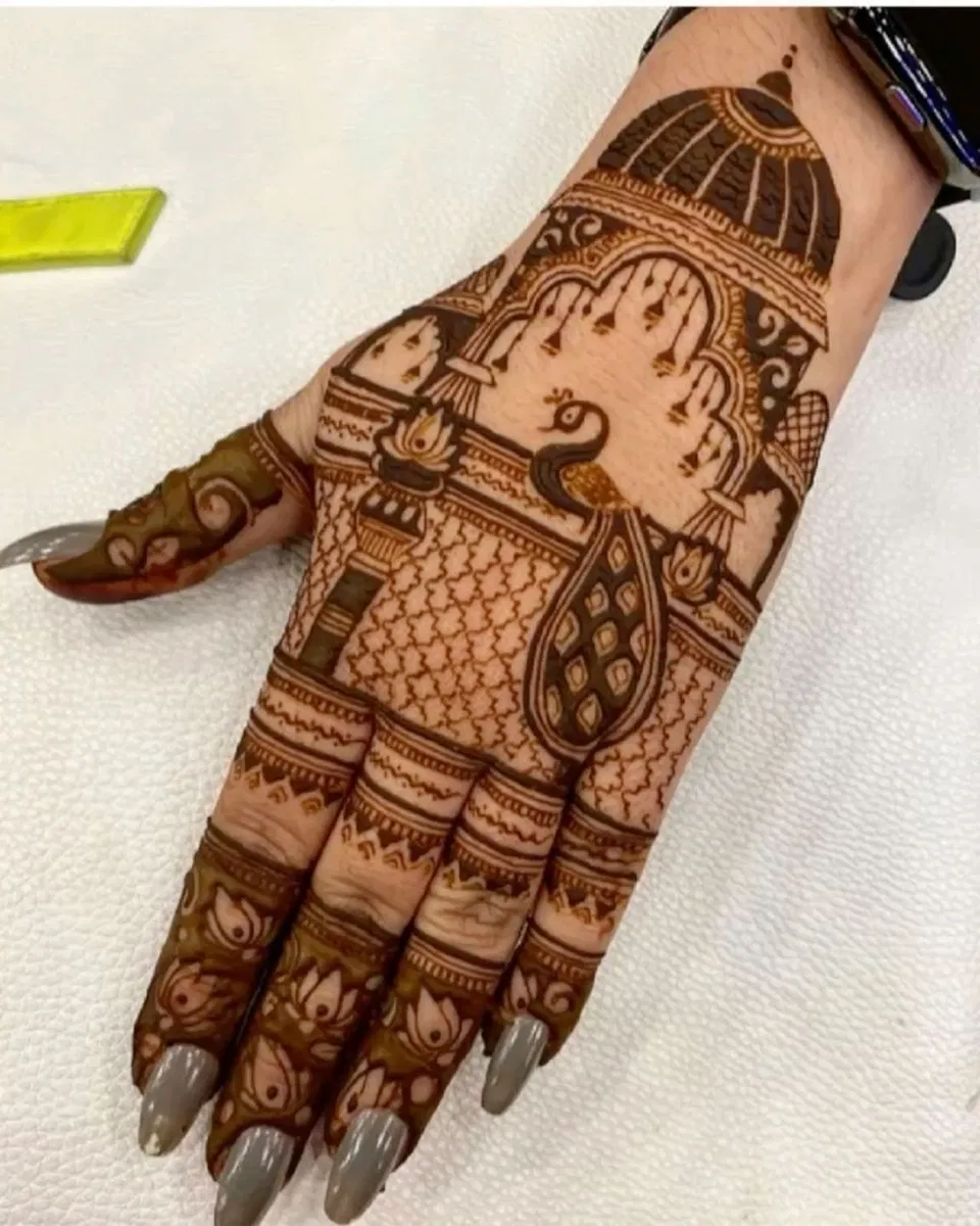 Bridal Indian Back Hand Mehndi Design with Figures, Lotus and Peacock for Diwali