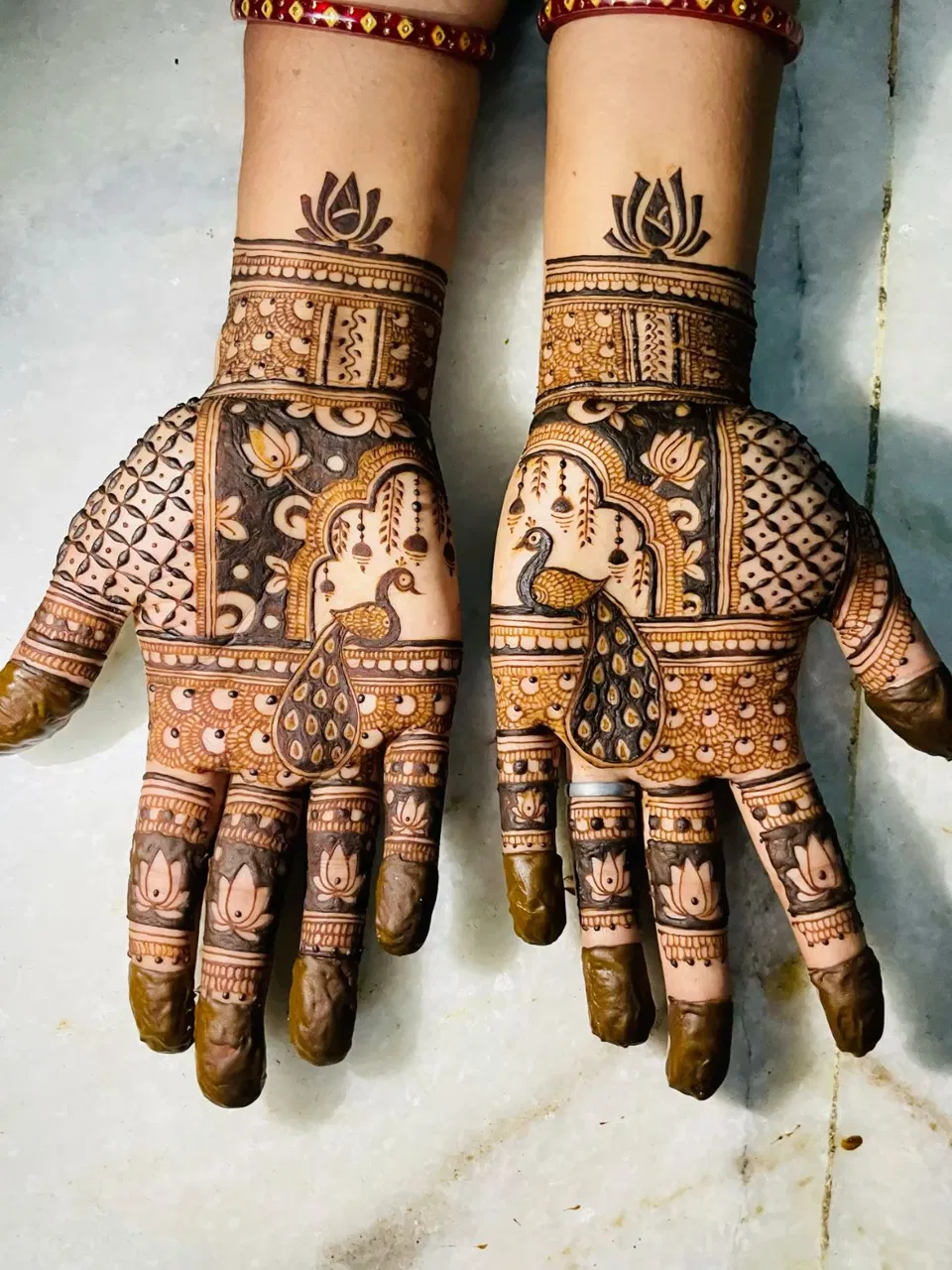 Bridal Dubai Finger Mehndi Design with Gol Tikki and Figures