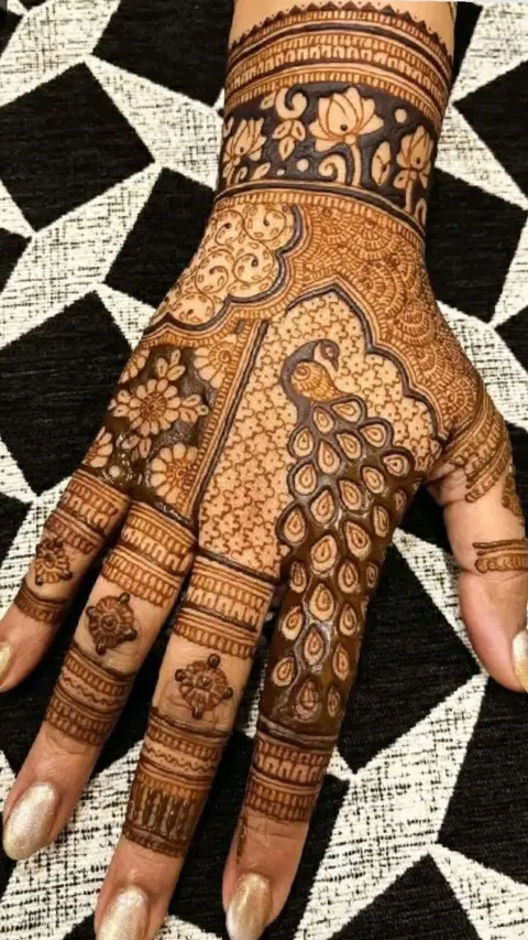 bridal indian peacock back hand mehndi design
