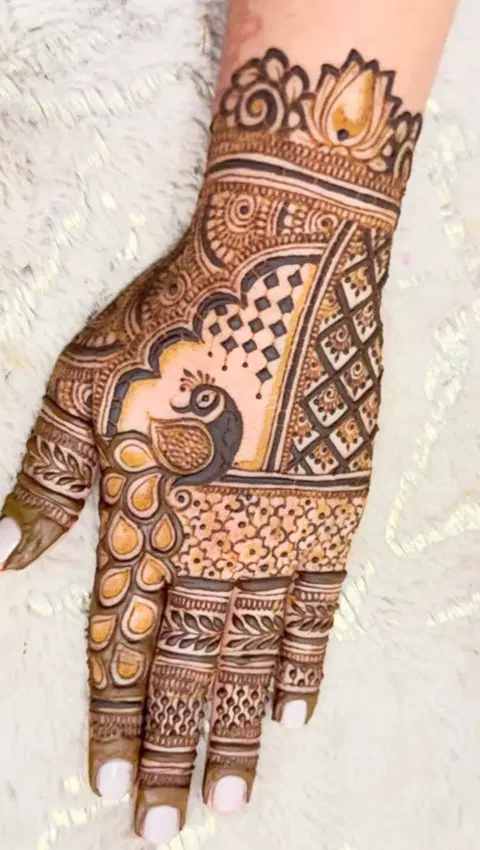 bridal royal figure back hand mehndi design