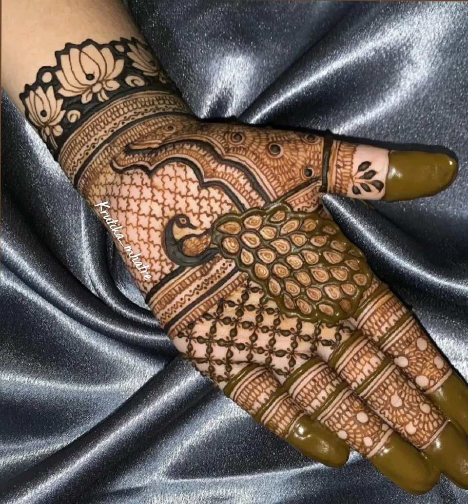 Bridal Royal Finger Mehndi Design with Gol Tikki and Peacock