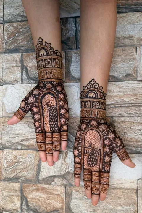 bridal indian peacock back hand mehndi design