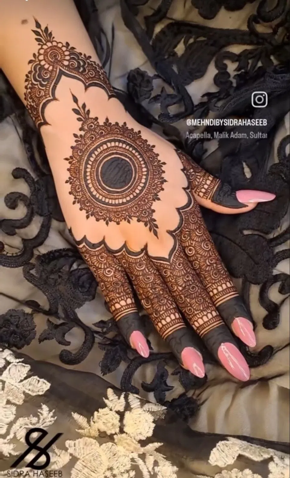 Aesthetic Minimal Arm Mehndi Design with Bel and Gol Tikki