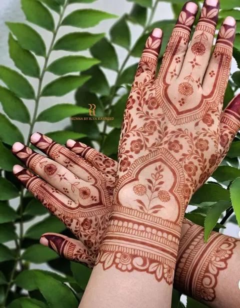 bridal indian figure back hand mehndi design