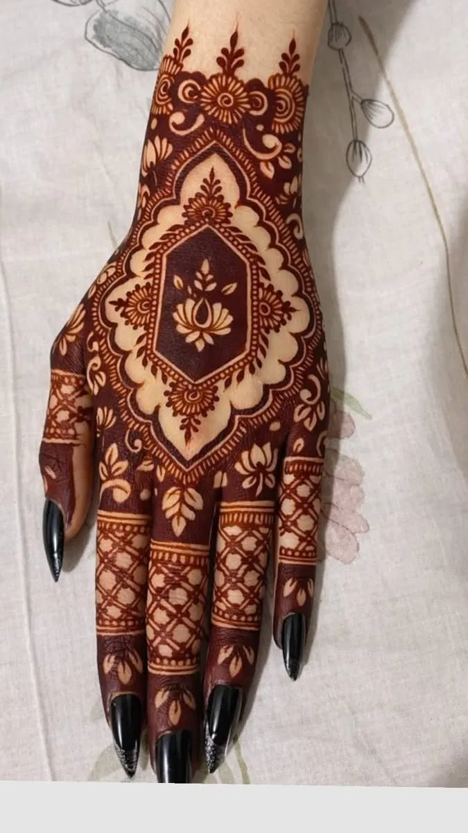 Aesthetic Arabic Back Hand Mehndi Design with Bel, Gol Tikki and Deity for Diwali