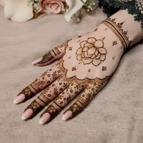 aesthetic bridal flower back hand mehndi design