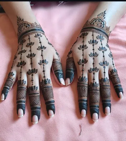 bridal minimal flower back hand mehndi design