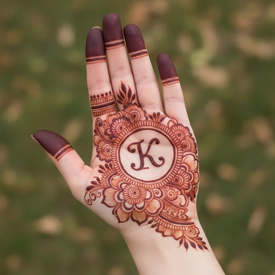Stylish Mehndi Design with Gol Tikki and Hidden Name