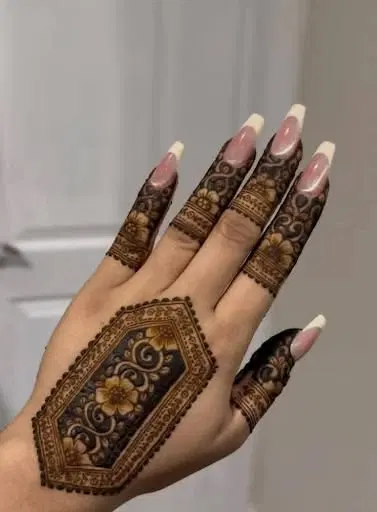 aesthetic royal back hand mehndi design