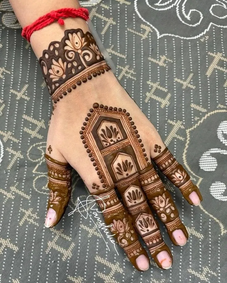 Aesthetic Arabic Back Hand Mehndi Design with Jaal and Lotus for Raksha Bandhan (2)