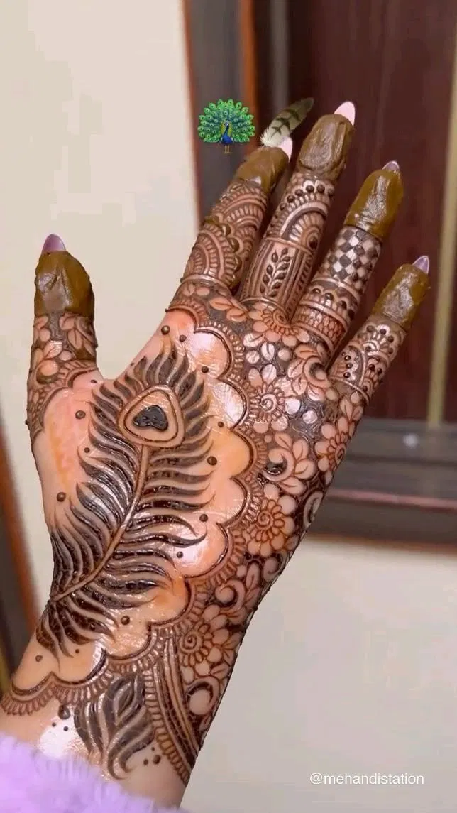 Stylish Front Hand Mehndi Design with Peacock for Teej