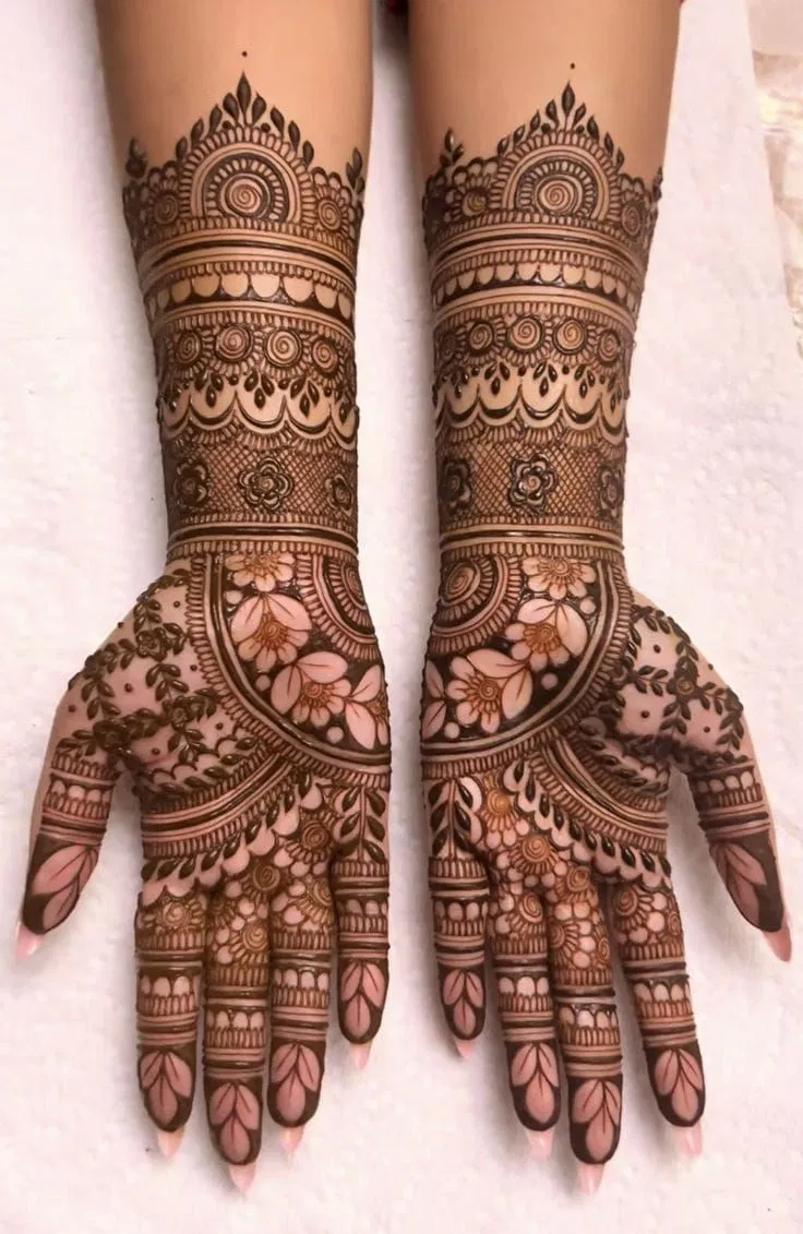 Bridal Stylish Arm Mehndi Design with Gol Tikki, Figures and Flowers