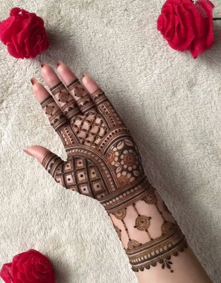 Bridal Back Hand Mehndi Design with Gol Tikki and Flowers for Raksha Bandhan