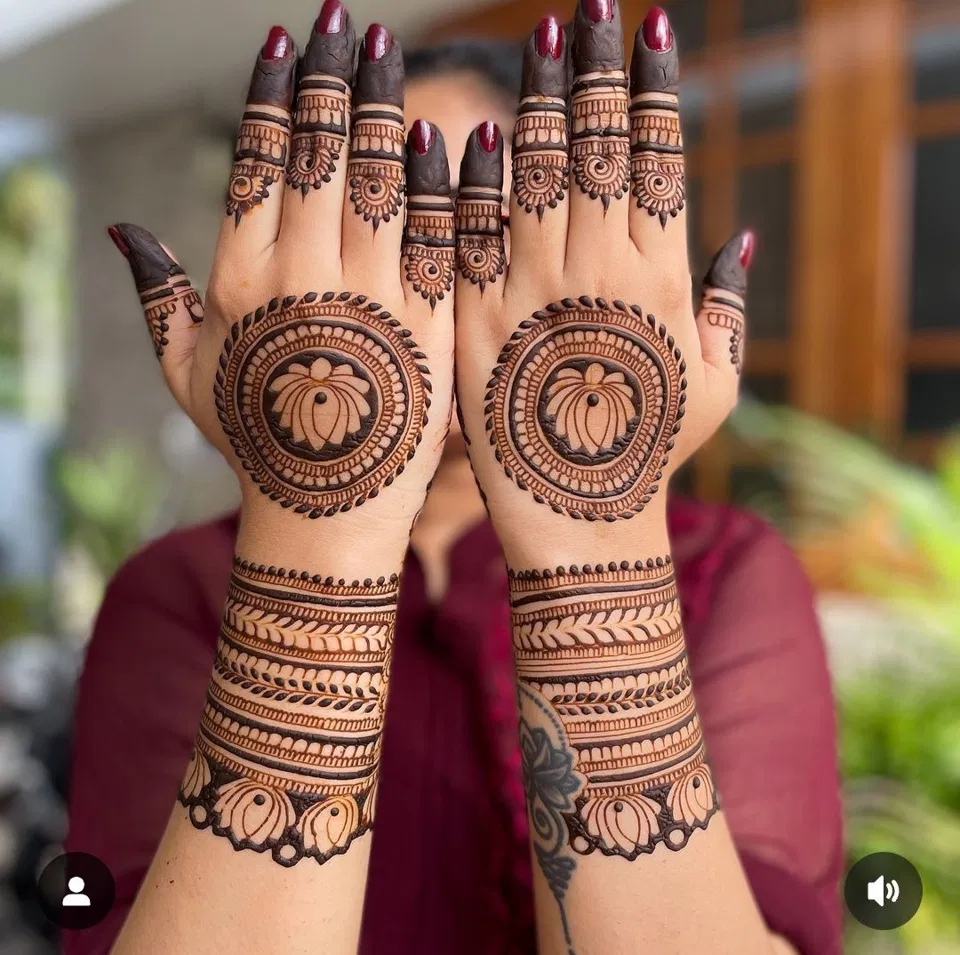 Bridal Stylish Back Hand Mehndi Design with Gol Tikki and Lotus (2)