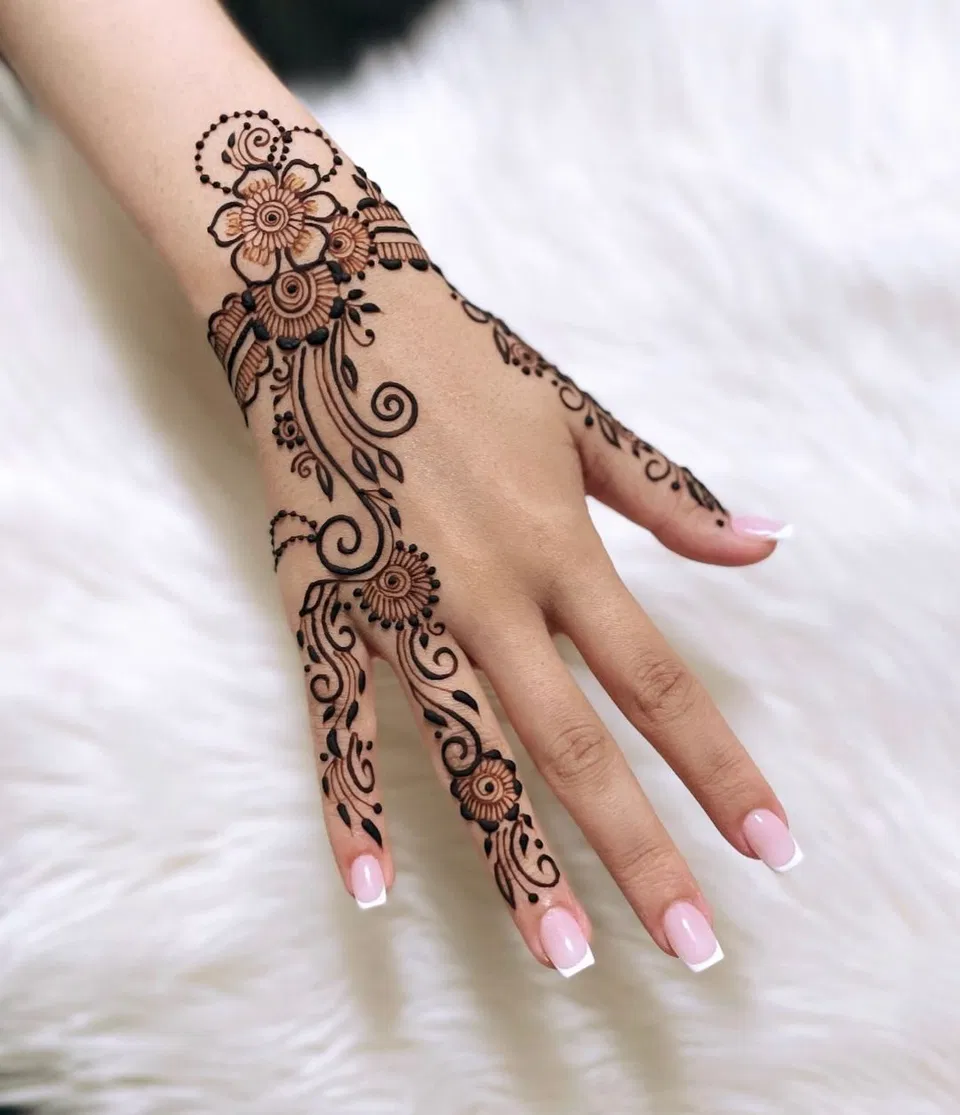Arabic Simple Back Hand Mehndi Design for Raksha Bandhan