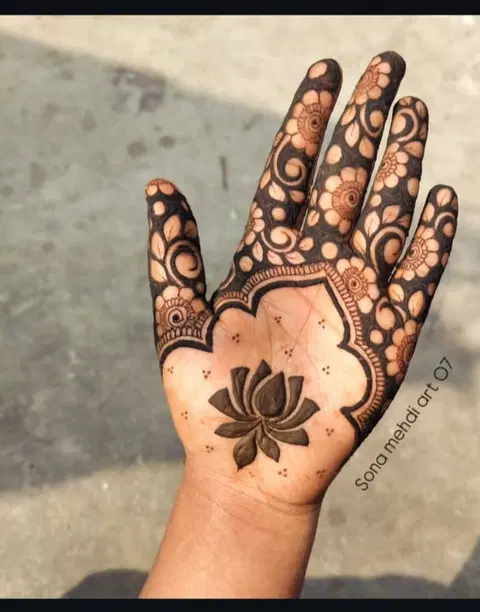 aesthetic simple lotus front hand mehndi design