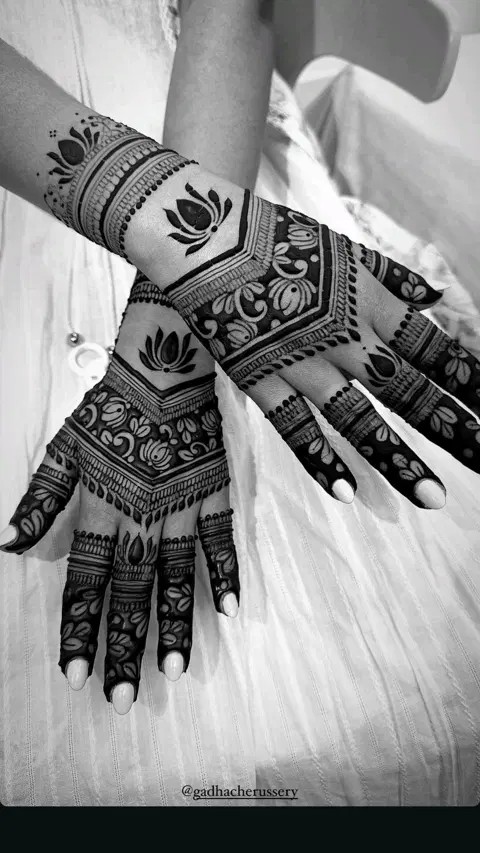 aesthetic bridal figure back hand mehndi design