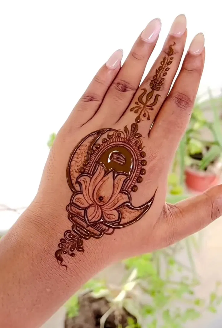Simple Stylish Back Hand Mehndi Design with Deity, Figures and Lotus for Sawan