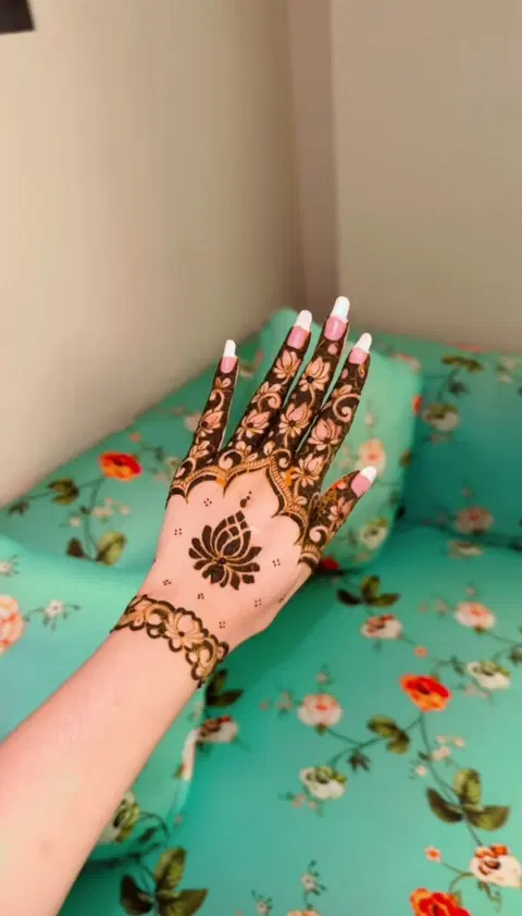 aesthetic simple flower back hand mehndi design