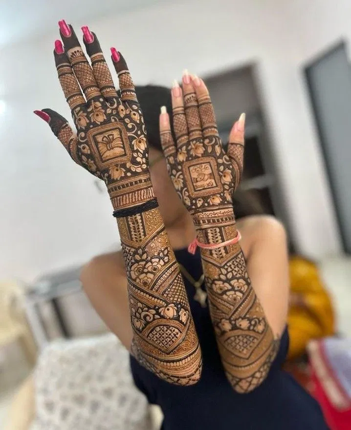 Bridal Back Hand Mehndi Design with Figures