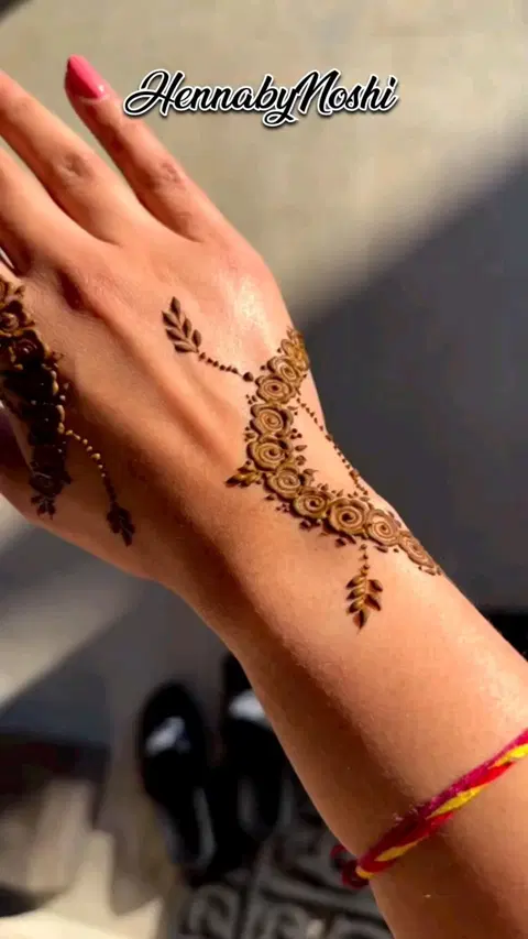 aesthetic simple flower arm mehndi design