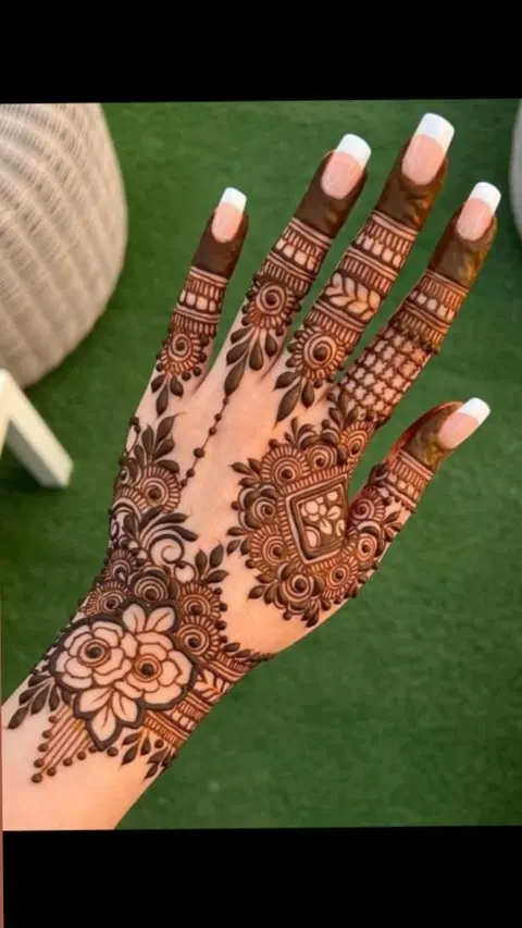 aesthetic arabic flower back hand mehndi design