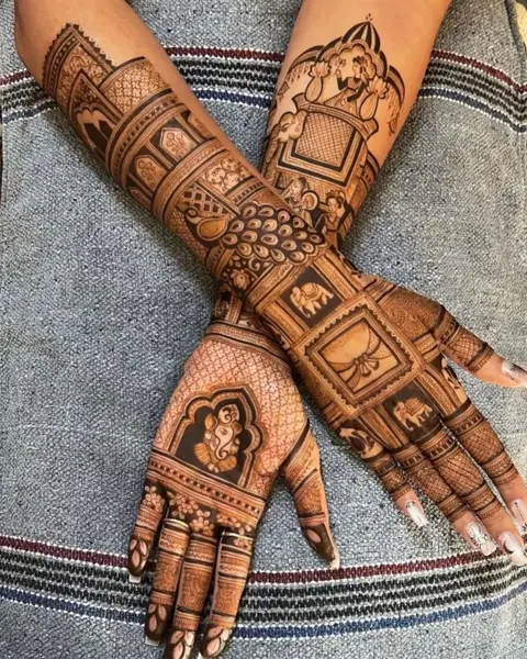 bridal indian deity back hand mehndi design