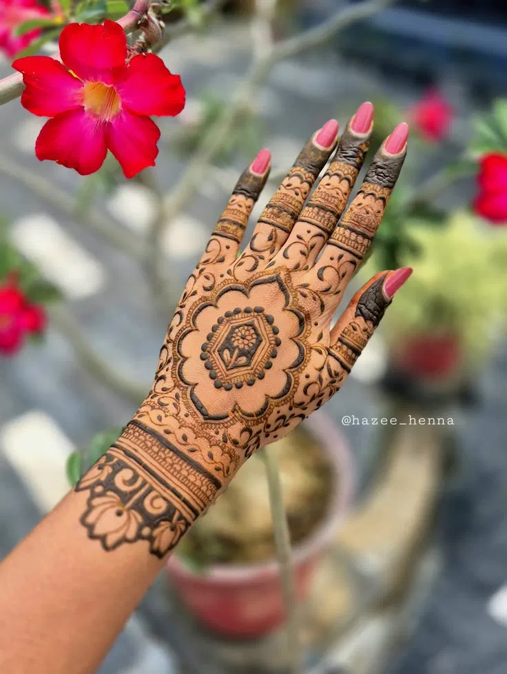 Simple Stylish Back Hand Mehndi Design with Gol Tikki and Flowers
