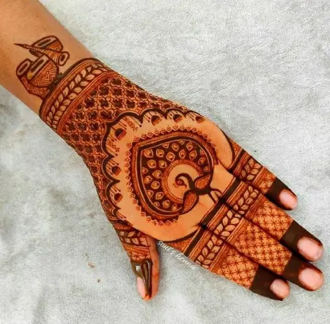 arabic peacock back hand mehndi design