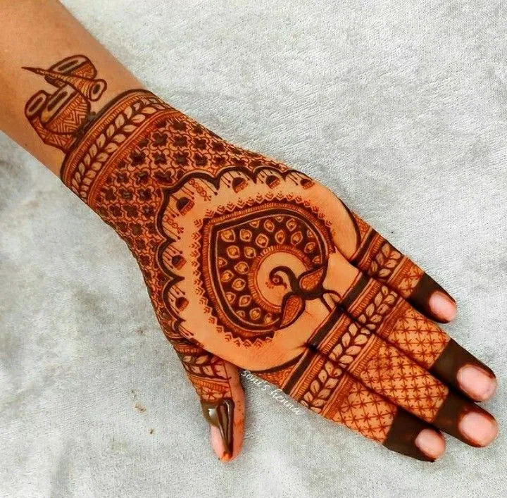 Arabic Back Hand Mehndi Design with Peacock