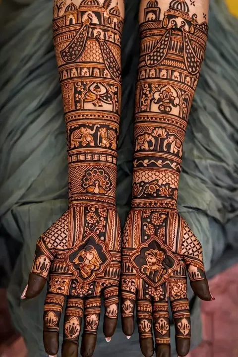 bridal indian figure back hand mehndi design