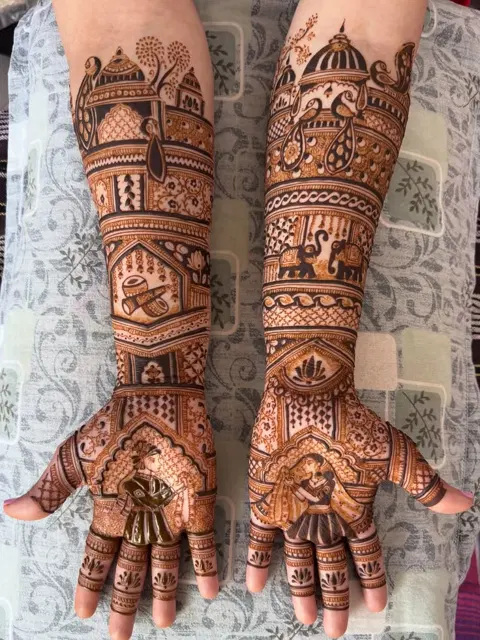 bridal stylish figure front hand mehndi design