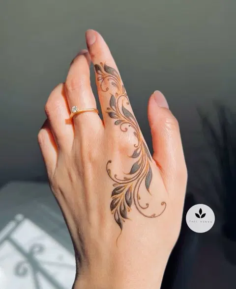 aesthetic arabic flower back hand mehndi design