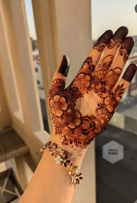 aesthetic bridal flower finger mehndi design
