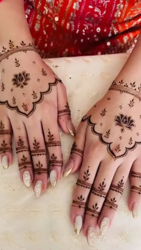 aesthetic minimal flower back hand mehndi design